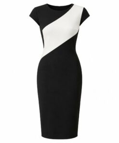 Women's black and white cocktail dress with geometric color-block bodice, ghost mannequin front view on white