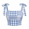 Women's blue and white checkered patchwork linen blend crop top with shoulder ties, ghost mannequin front view on white