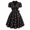 Women's black taffeta belted wrap dress with small pink butterfly print and full skirt, ghost mannequin front view on white