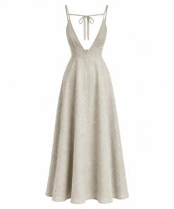 Back view of tie back linen dress showing the deep V back and bow, on white